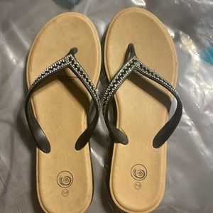 Black flip flops with sparkles